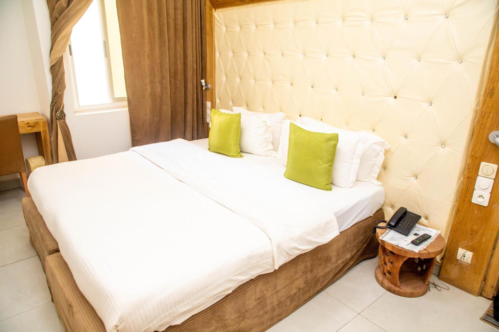 Hotel Les Orchidees Cotonou Værelse billede