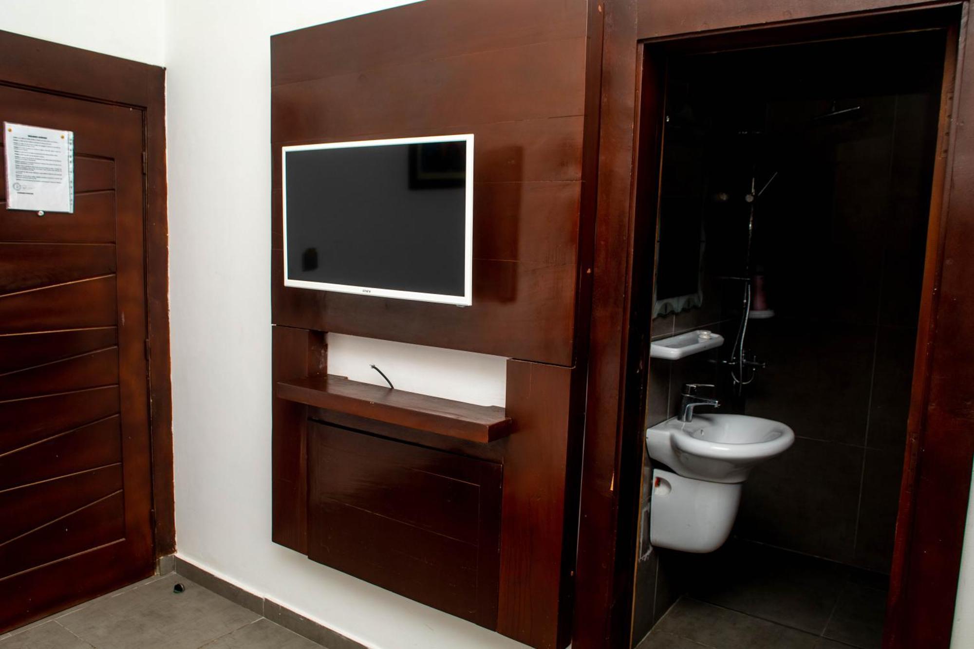 Hotel Les Orchidees Cotonou Værelse billede